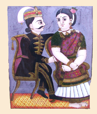 The Raja and Rani are in seated posture.